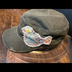 Distressed hat with patchwork bird